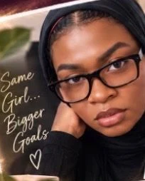 Talaa of It’s Talaa 24/7 in glasses and a black hijab